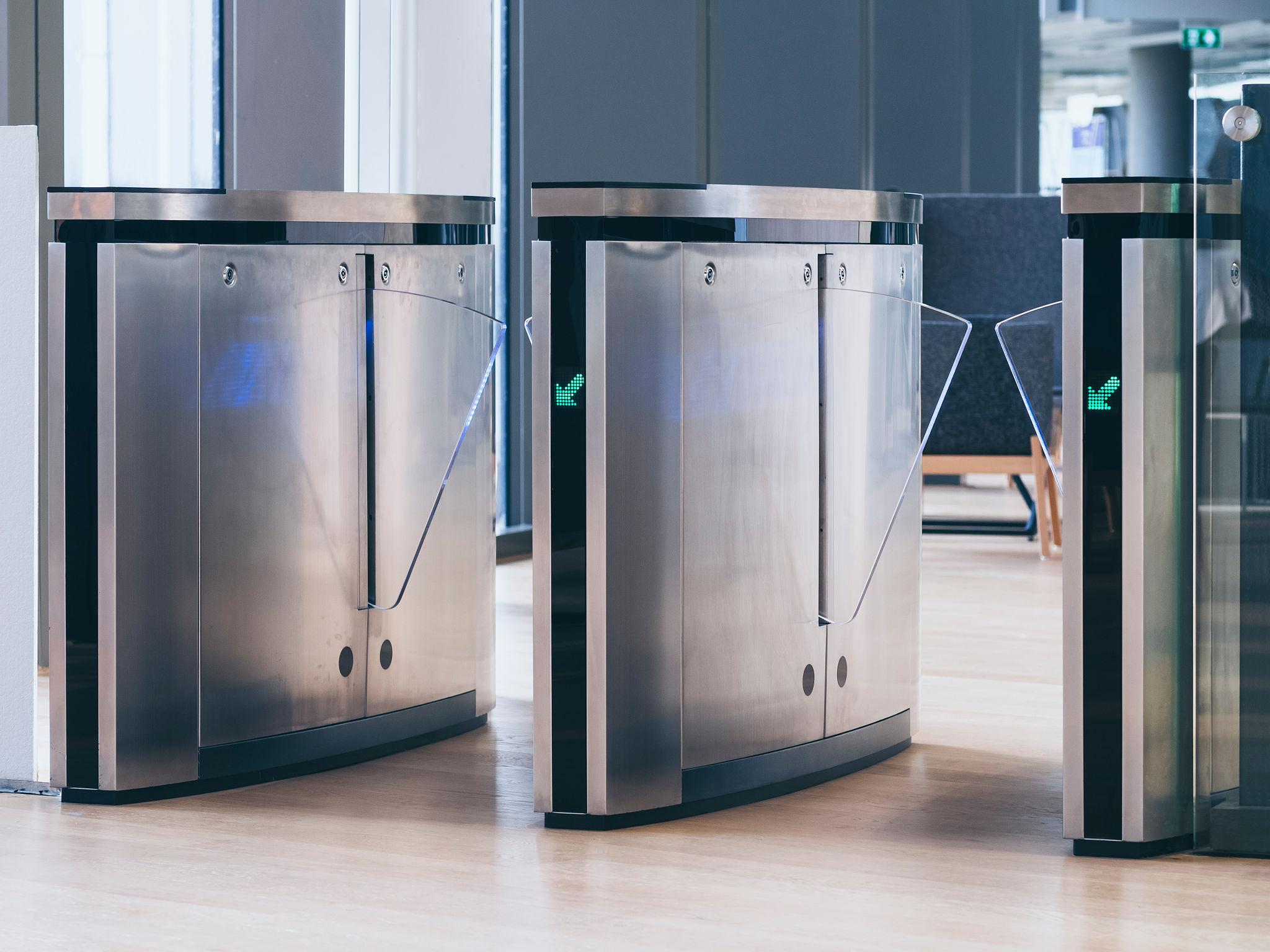 Access control turnstiles and terminals in a modern lobby